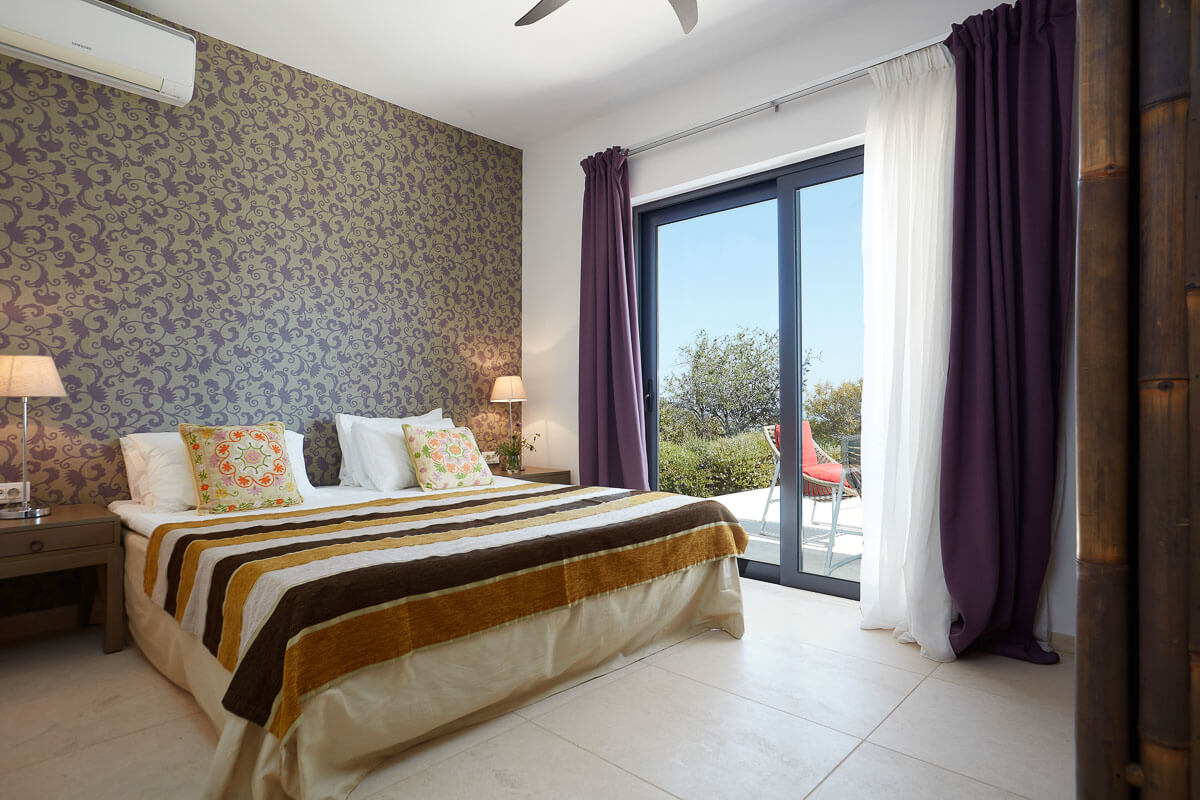 A photo of one of the bedrooms in the Spitaki Longhouse Crete